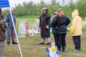 Some handlers were brave enough to come out from under the tent!  Photo by Joan Morgan