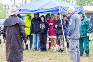 Staying dry during the judge's briefing.  Photo by Joan Morgan